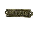 Antique Gold Cast Iron Head Sign 6""